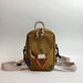 (R)evolution Daily Crossbody